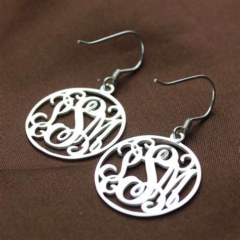 Rose Monogram Earrings in Silver .